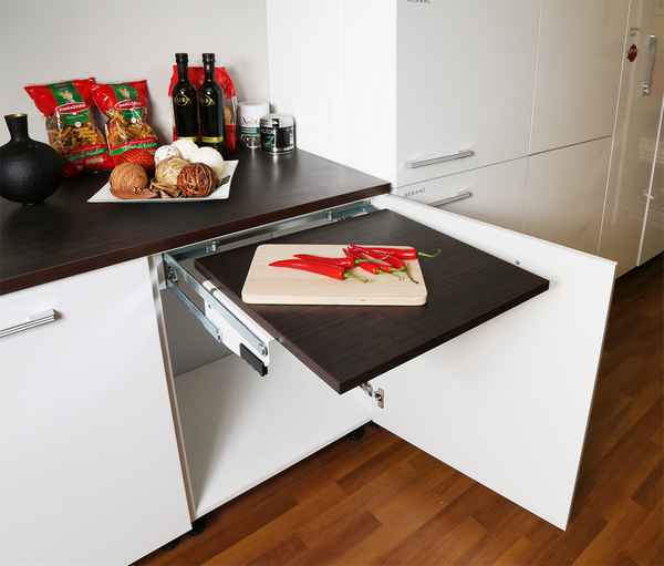 Интерьер небольшой кухни: используем пpaктичный выдвижной стол
